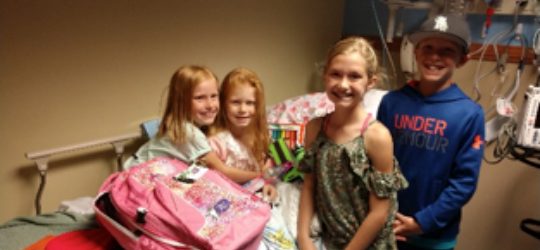 Kids in Hospital Room with Bags